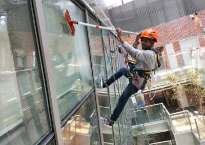 Facade cleaning services improving the exterior appearance of a commercial building