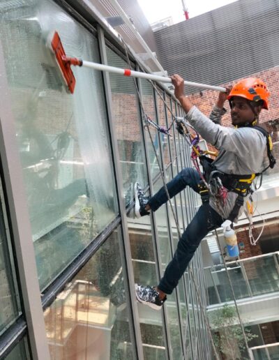 Facade cleaning services improving the exterior appearance of a commercial building