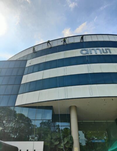 Facade cleaning Singapore performed on a high-rise commercial building